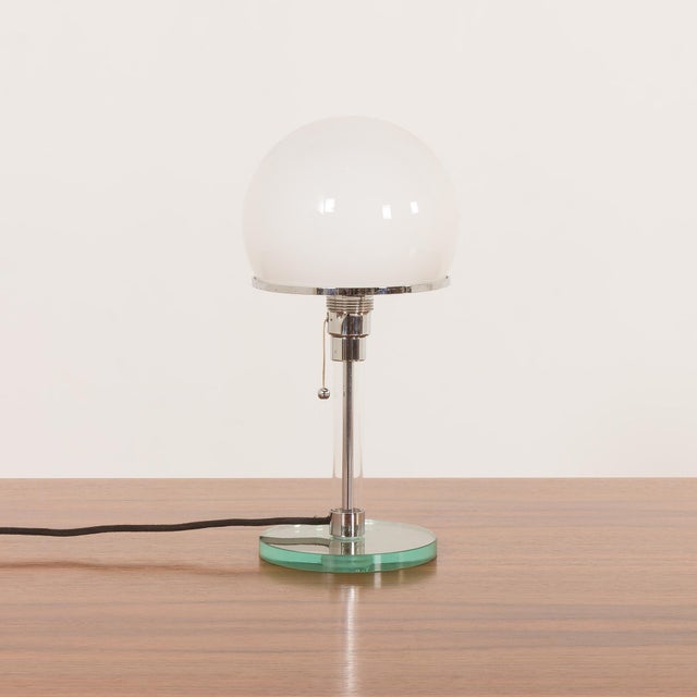 This wg24 table lamp was designed in 1924 as part of an assignment at the bauhaus school by wilhelm wagenfeld. This table...