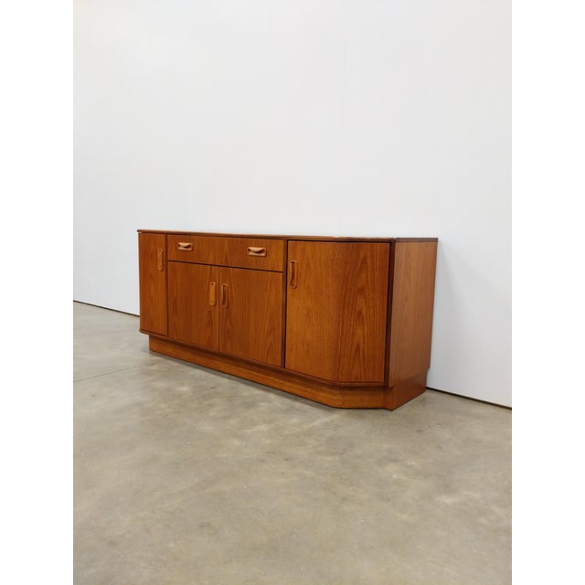 Authentic vintage mid century modern teak credenza / sideboard / console. "Fresco" series designed by Victor B Wilkins for...