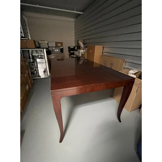 This dining table, which is part of Kindel's Metropolitan Collection. presents style and function combined. The graceful...