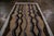 Hand knotted in Morocco between 1950-1960 with lush, high pile wool, this vintage Moroccan shag rug celebrates the classic...