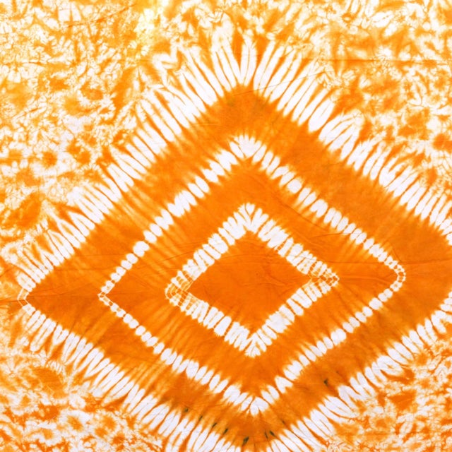 A great tie-dyed textile made by the Yoruba people of Nigeria. This pattern is created using a starch-resist technique...