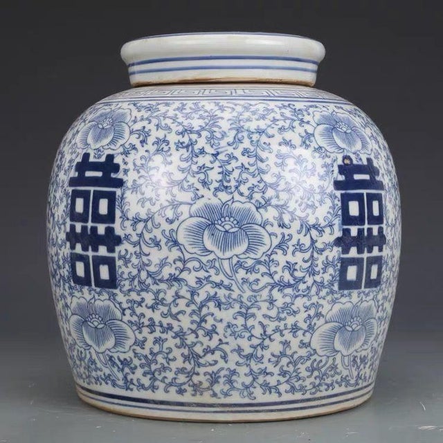 This impressive jar features a classic, full-bodied, and rounded shape. It is meticulously hand-painted in rich cobalt...