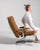 Chrome-frame swivel chair in Warm Tan Leather. Finished in warm tan leather, this chrome-frame swivel chair is...