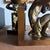 Brass God holding the World. Midcentury modern, fine art and functional, these bookends will hold your stories as well as...