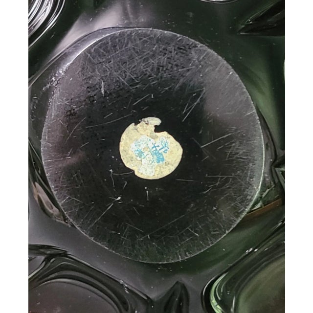 Add a touch of vintage charm to your home decor with this stunning flower-shaped bowl from Murano. Made of high-quality...