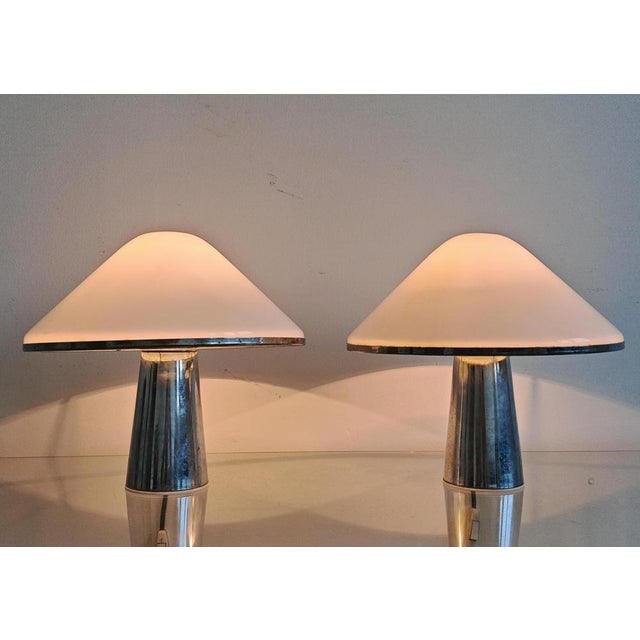 In this listing you will find a pair of exceptionally rare table lamps designed by Harvey Guzzini. This model is called...