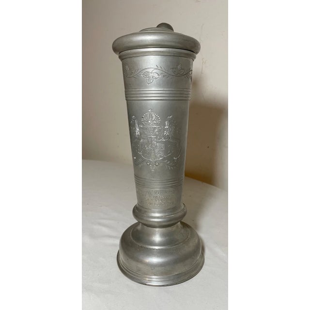 Up for sale we have a rare antique pewter lidded stein/pitcher archery award made by Reed and Barton. It has a lovely...