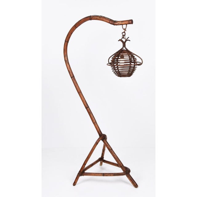 Amazing Mid-Century modern bamboo and rattan Floor Lamp. This fantastic item was produced in Italy during the1950s. This...