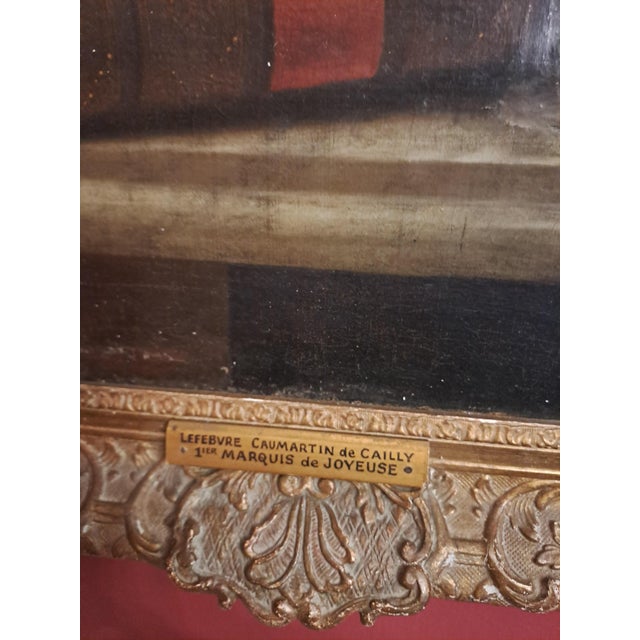 A striking 18th century French oil on canvas portrait depicting a distinguished nobleman identified as Lefebvre Caumartin...