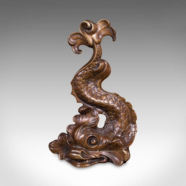 This is an antique mythical dolphin doorstop. An English, bronze door keeper, dating to the Regency period, circa 1820....