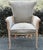 Unique Cerused French regency chair with robustly carved legs and back insets. Chair features a mushroom grey upholstered...