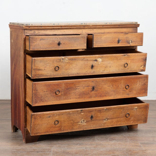 Early 19th century Swedish chest of five drawers, crafted in pine and retaining its original hand painted finish. Much of...