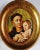 Saint Anthony Holding the Infant Jesus in a Gold Leaf Frame Celebrate your faith with this holy image depicting the Patron...