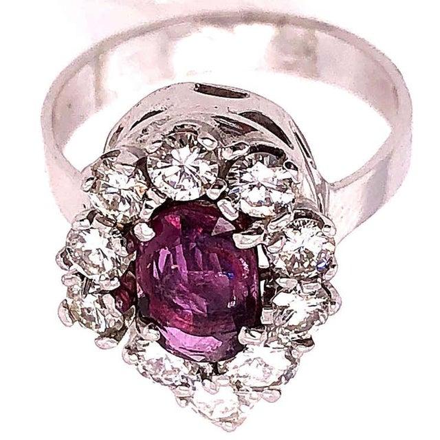 2010s 14 Karat White Gold Fashion Oval Ruby Solitaire Ring With Encircling Diamonds, Size 7.25 For Sale - Image 5 of 12