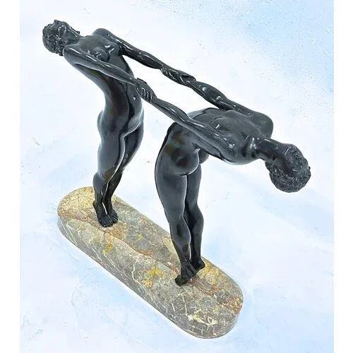 Vintage Art Deco style bronze male and female couple in dance pose sculpture. Figures mounted to a marble base. No maker's...