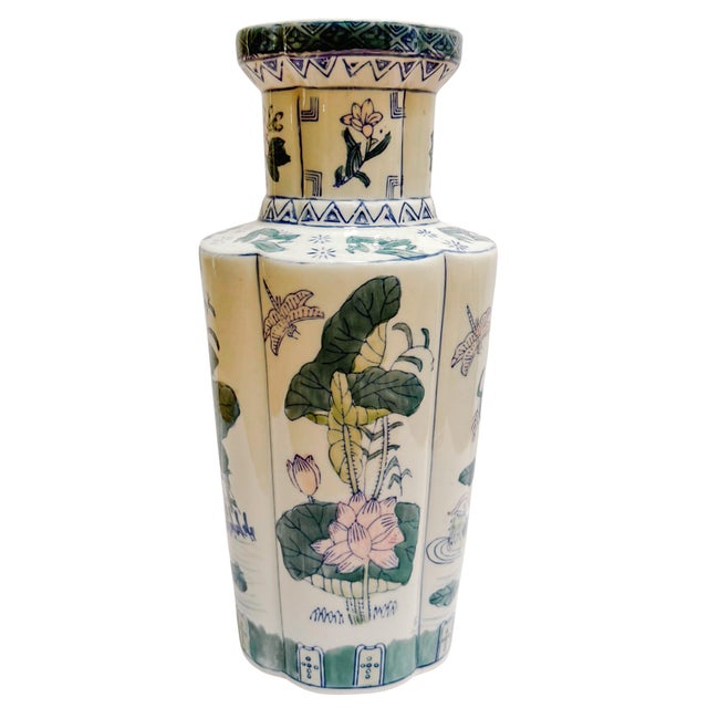 Beautiful green, pink and blue Chinoiserie vase in a quatrefoil (four leaves) shape featuring four panels: two depicting...