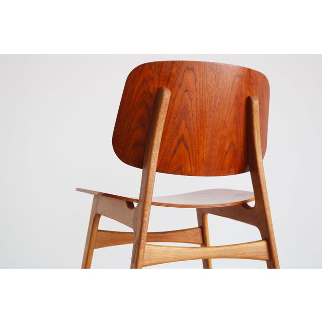 A rare and highly sought-after set of six original Model 155 “Shell Chairs”, designed by the renowned Danish designer...
