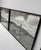 Pair of vintage black-and-white photographic prints showing the Golden Gate Bridge from two different viewpoints. The...