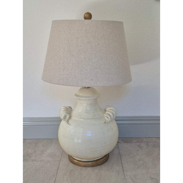 These Wildwood lamps are handmade in Italy by Florentine artisans. The finish is an ivory glaze and the lamps have a gold...