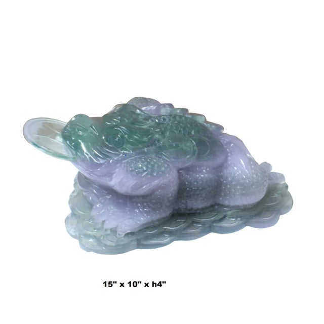 This is a Chinese decorative light green purple white mix natural stone fortune Toad figure with precise details and nice...