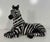 Elegant zebra sculpture produced in Bassano del Grappa, Italy. Hand-decorated in glazed ceramic, it features beautifully...
