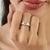 The Baguette-Cut Natural Aquamarine Ring features a blue aquamarine in a clean, elongated setting, complemented by small...
