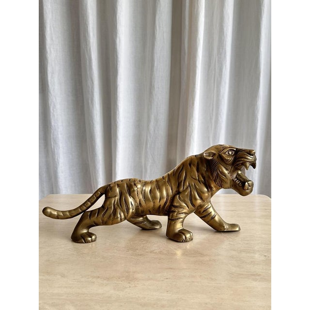 Amazing solid brass tiger sculpture. The king of the jungle carries a precious and elegant aura, which is matched by the...