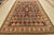 This traditional Caucasian Kazak rug is hand-knotted with an all-wool pile on a cotton foundation. This rug is new and in...