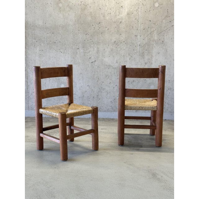 Meet this exceptionally striking pair of modernist dining chairs, beautifully crafted in the distinctive style of the...