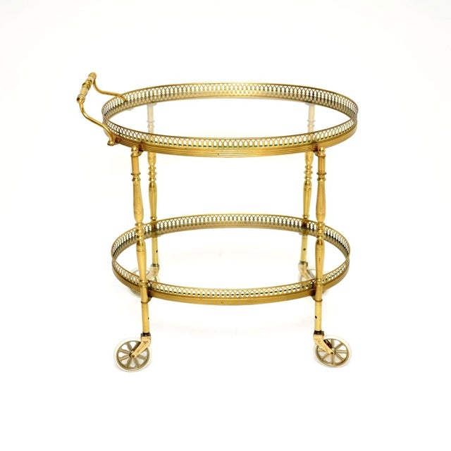 A beautiful vintage French brass drinks trolley. This was recently imported from France, it dates from the 1960’s. It is...