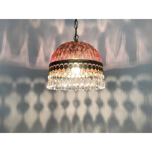 Vintage Pink Pendant Light with Tassels and Patterned Glass Globe Beautiful pink glass pendant light with tasseled glass...