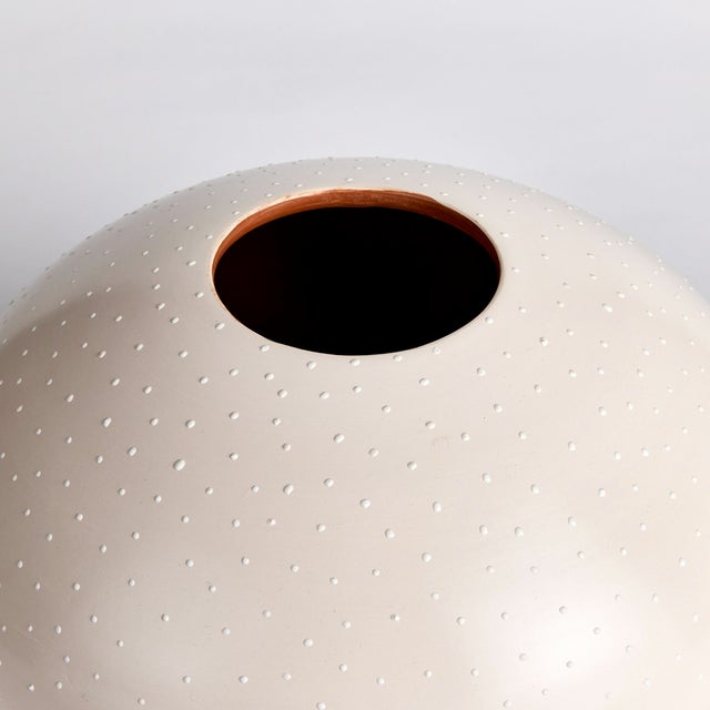 Made in Chulucanas Peru, this handcrafted vase is the product of warm climate, Peruvian clay and an artisans touch....