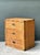 This vintage woven rattan chest of drawers is a beautifully preserved example of mid-century craftsmanship, blending...