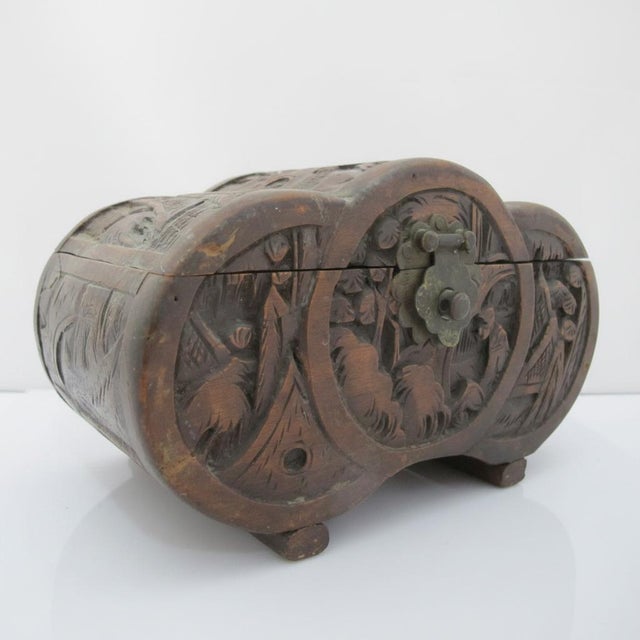 Chinese carved wood keepsake box, most likely early to mid 20th century. Carved camphor wood showing traditional Chinese...
