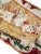 This 19th-century woven tapestry features a charming decorative scene of kittens nestled together in a basket. The...