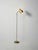Floor lamp in brass and gold-plated metal, with a round base and adjustable gooseneck arm; tapered head with anti-glare...