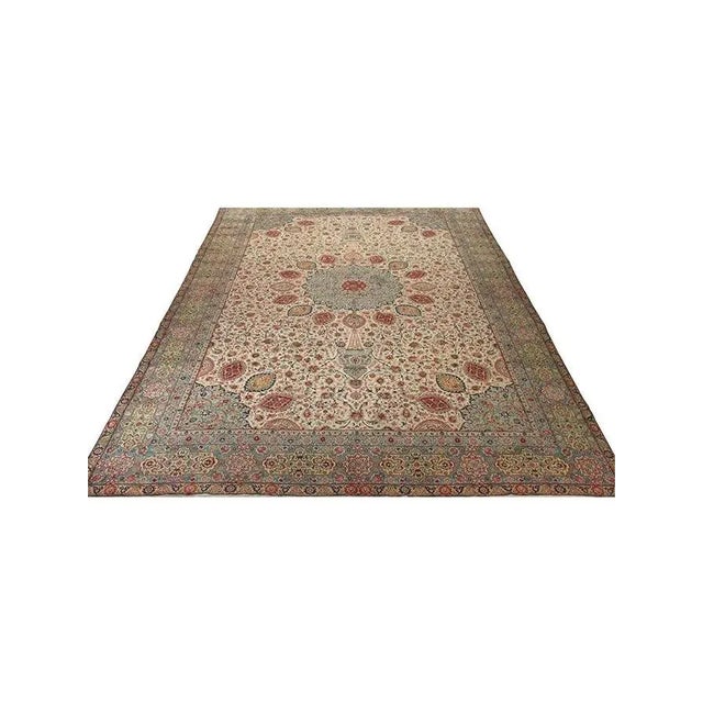 Old Persian Tabriz rug: A seasoned beauty from Tabriz, boasting timeless allure with its refined designs, subtle colors,...