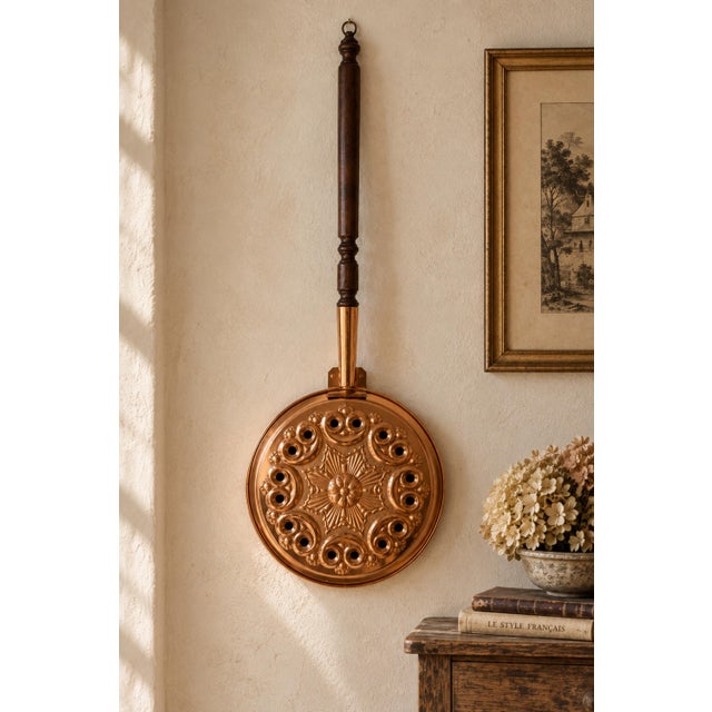 A striking vintage French copper bed warmer, or bassinoire, by L. Lecellier of Villedieu, Normandy, dating approximately...