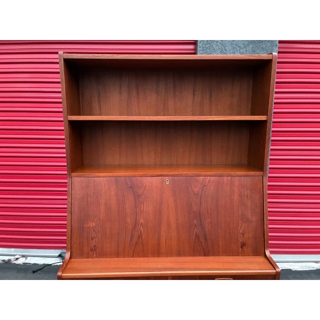 Beautiful vintage Danish teak bookcase/secretary desk by HP Hansen featuring classic mid-century modern design and warm...
