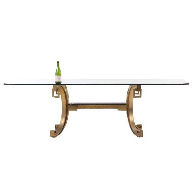 An exceptional example of mid-century architectural design, this substantial dining table features a massive, hand-cast...