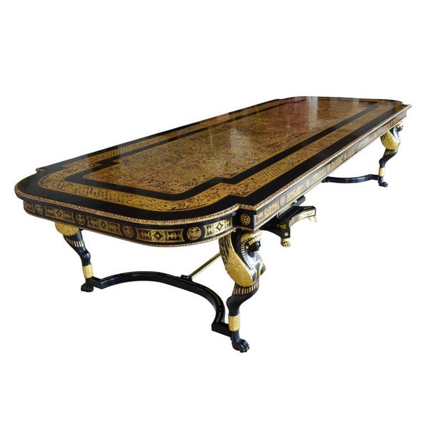 This is a monumental Vintage ebonised Red Boulle dining table which can seat twelve people in comfort, but would also be...