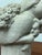 Design Plus Gallery presents a Vintage Flower Bearer Figural Sculpture. This sculptural plaster piece depicts a serene...