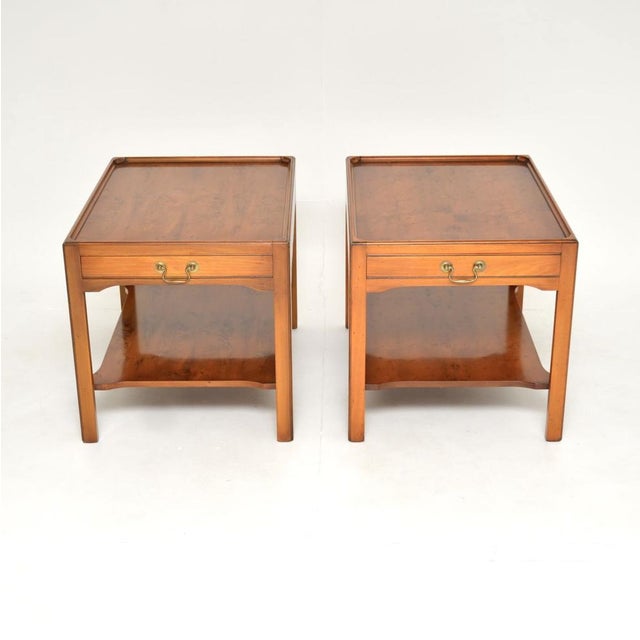 A very well made and useful pair of antique Georgian style yew wood side tables. They were made in England, and date from...