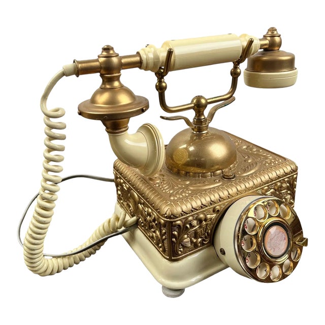 Vintage French Style Brass Rotary Telephone With Ornate Repoussé Cream Enamel Base For Sale