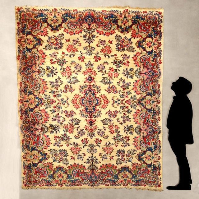 Kerman rug in cotton and wool, hand-made, large knot. This piece is attributed to the mentioned designer/maker. It has no...
