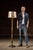 Vintage modernist brass floor lamp. This striking floor lamp features a tiered brass column base and dual pull-chain...