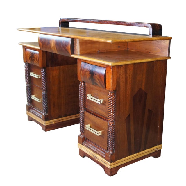 An early 20th century American Empire & Art Deco Desk. The desk began its life as a traditional kneehole before being...