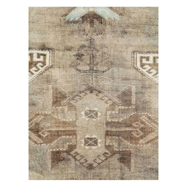 A vintage Turkish Anatolian rug from the mid-20th century. Measures: 7' 3" x 9' 2".