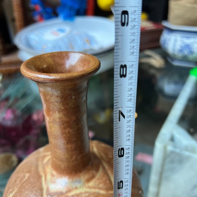 Up for consideration is a beautiful brown ceramic boho chic vase, signed by the artist. This is a simple piece that brings...