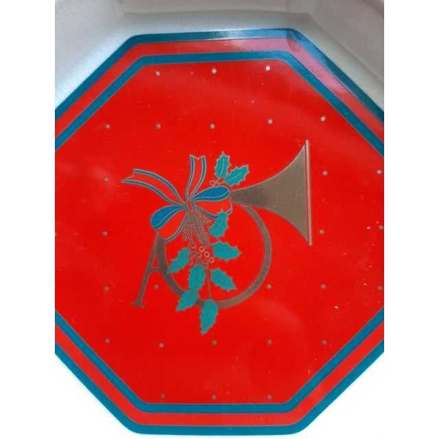 **Christmas French Horn Octagon Small Dish Pair** This charming pair of small dishes features a delightful design in red,...